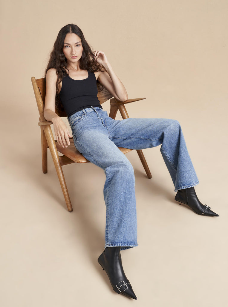 Relaxed and easy, this high rise, wide leg, in non-stretch denim is that favorite jean that you wear on repeat whether with a sneaker or leveling up with a heel. 